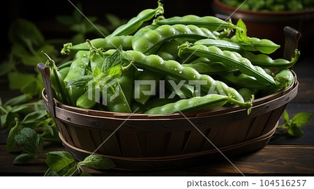 Sugar snap peas with mint on wood background, Fresh green peas. Sugar snap peas with mint on wood background, Fresh green peas. 104516257