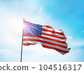 American flag on the blue sky 104516317