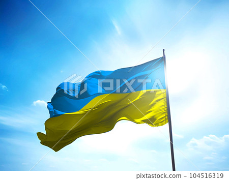 Ukraine flag waving on the blue sky Ukraine flag waving on the blue sky 104516319