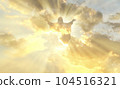 Jesus Christ In The Clouds Of Heaven gold sky background 104516321