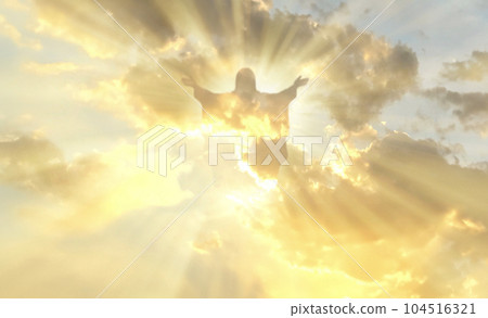 Jesus Christ In The Clouds Of Heaven gold sky background 104516321