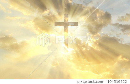 Christian cross appears bright in the gold sky Christian cross appears bright in the gold sky 104516322