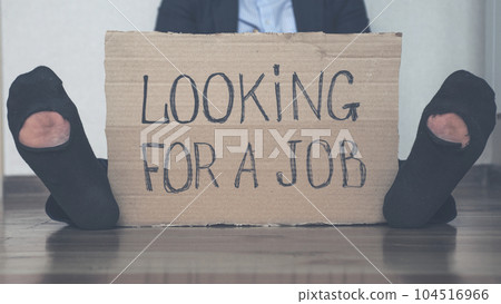 A young businessman who lost his job due to quarantine is looking for a job 104516966
