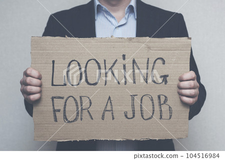 A young businessman who lost his job due to quarantine is looking for a job 104516984