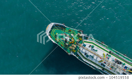 Aerial top view ship tanker gas LPG on the sea for transportation, Sea transportation of Liquefied Petroleum Gas LPG tanker to LPG terminal for gas loading. 104519558