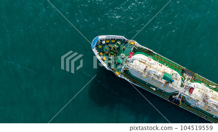 Aerial top view ship tanker gas LPG on the sea for transportation, Sea transportation of Liquefied Petroleum Gas LPG tanker to LPG terminal for gas loading. 104519559