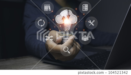 Businessman holding Light bulb Global Internet connection. Businessman holding Light bulb Global Internet connection. 104521342
