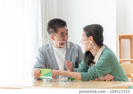 Senior couple looking at the passbook Senior couple looking at the passbook 104521555