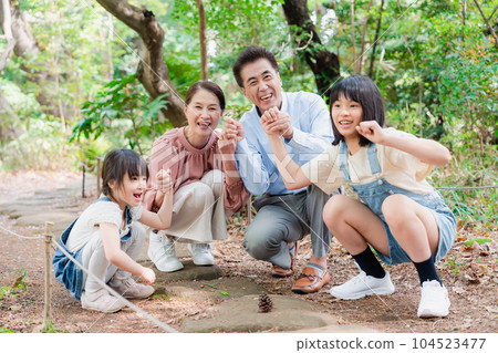 Grandchildren playing at their grandparents' house in the countryside 104523477