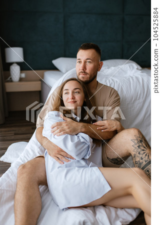 earlier morning bride and groom at home 104525884