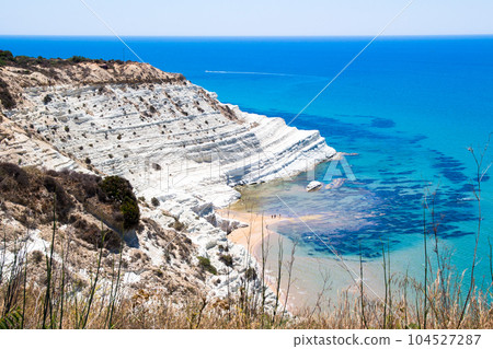 The Scala dei Turchi, a rocky cliff on the southern coast of  Sicily, Italy. 104527287