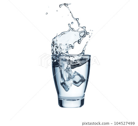 Ice cube splashes into glass of pure water Ice cube splashes into glass of pure water 104527499