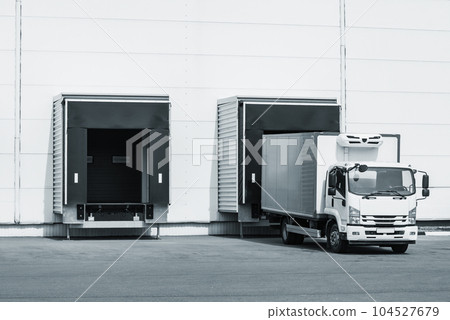 Freight truck stands by the door. Freight truck stands by the door. 104527679