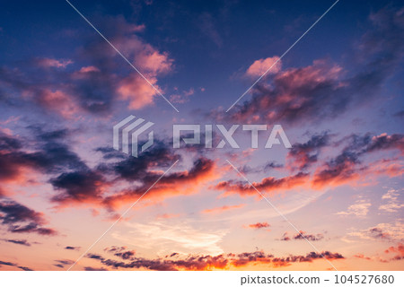 Amazing cloudscape on the sky at sunset time. Amazing cloudscape on the sky at sunset time. 104527680