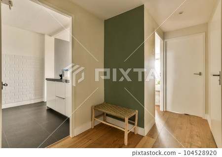 an empty room with a bench in the middle and a door leading to another room on the other side, an empty room with a bench in the middle and a door leading to another room on the other side, 104528920