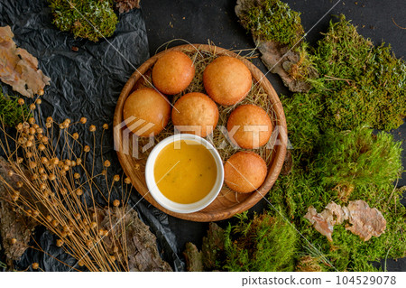 Ruddy cottage cheese pancake with sauce isolated 104529078