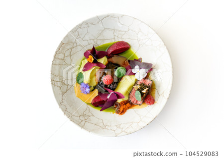 Black beef steak with mashed potatoes, raspberries, sauce and black caviar Black beef steak with mashed potatoes, raspberries, sauce and black caviar 104529083