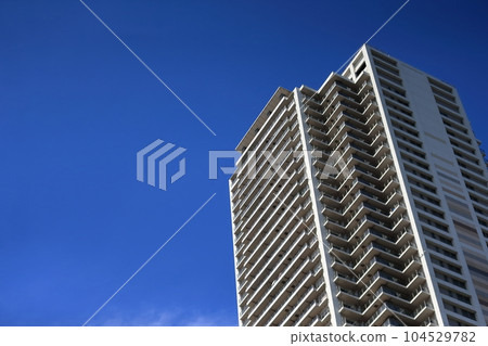 Blue sky and tower apartment 104529782