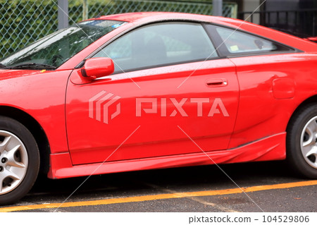 domestic red sports car 104529806