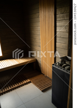 Interior of wooden Finnish sauna. classic wood sauna. 104530427