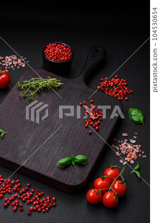 Ingredients for cooking cherry tomatoes, salt, spices and herbs 104530654
