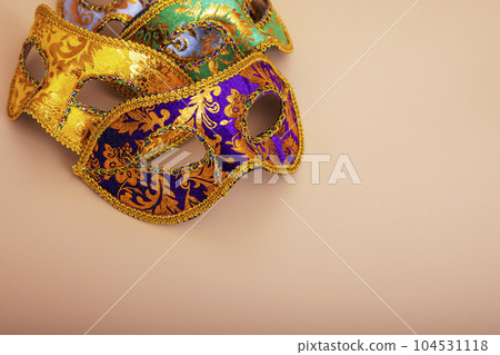 Carnival masks on color background. Purim celebration concept 104531118