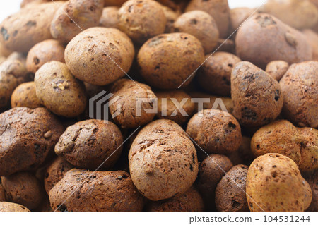Expanded clay. small lumps of clay used in construction and for growing plants. 104531244