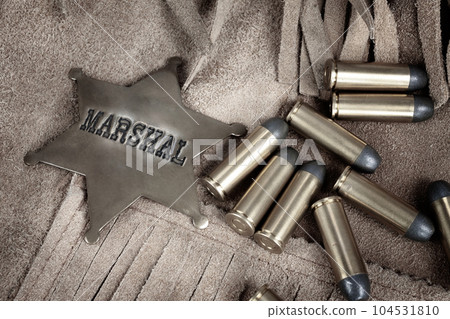 Old west marshal badge with ammunition Old west marshal badge with ammunition 104531810