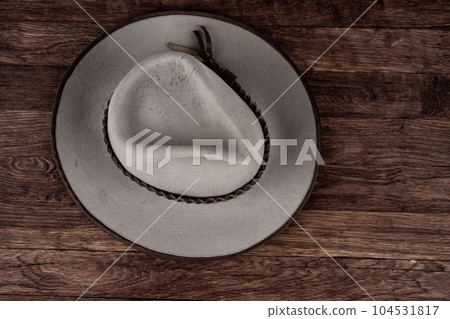 Old west hat on table. Top view. 104531817