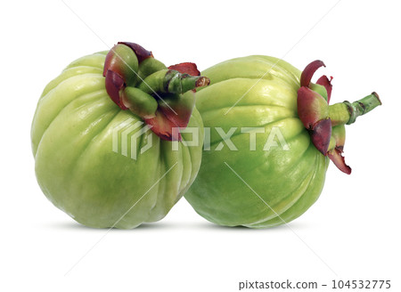 Garcinia atroviridis fruit isolated on white background 104532775