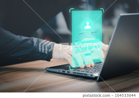 Adult Man type his user and password on a computer laptop. Cyber security concept to protect personal data. Secure encryption and access to the user's private information to access the internet. 104533044