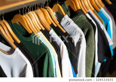 Assortment of summer clothing in modern store Assortment of summer clothing in modern store 104533935