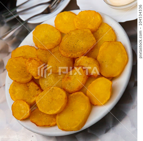 Appetizing Patatas Bravas 104534336