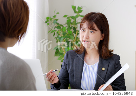 Female lawyer interviewing a counselor 104536948