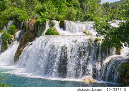 Beautiful Waterfall background. Beautiful Waterfall In Krka National Park - Croatia, Europe 104537840