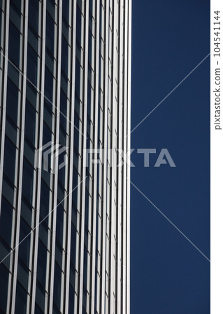 A high-rise building with a sharp and beautiful outer wall design A high-rise building with a sharp and beautiful outer wall design 104541144