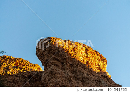 Sunset at Sesriem Canyon 104541765