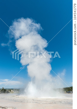 Geyser eruption in Yellowstone Geyser eruption in Yellowstone 104541779