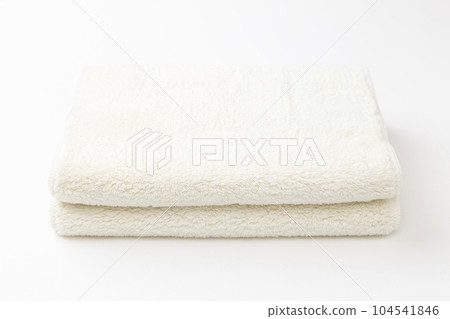 Folded towel white background Folded towel white background 104541846