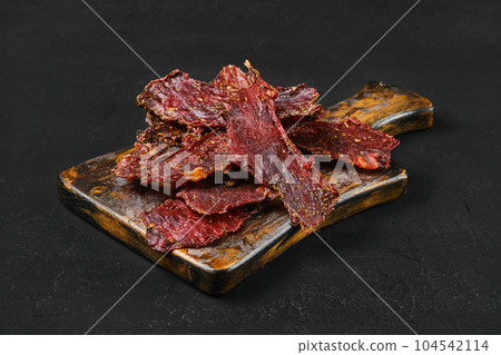 Heap of dried beef jerky Heap of dried beef jerky 104542114
