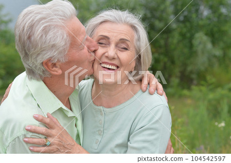 Happy senior couple in love. Park outdoors. Happy senior couple in love. Park outdoors. 104542597
