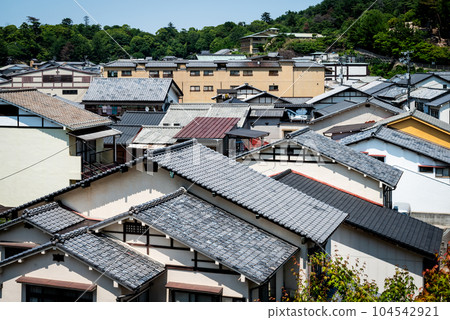 The scenery of the densely packed residential area seen from the hill in Miyajima, Hiroshima Prefecture is beautiful. The scenery of the densely packed residential area seen from the hill in Miyajima, Hiroshima Prefecture is beautiful. 104542921