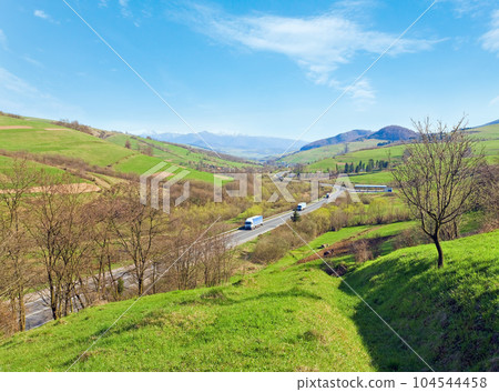 Spring mountain country valley view Spring mountain country valley view 104544458