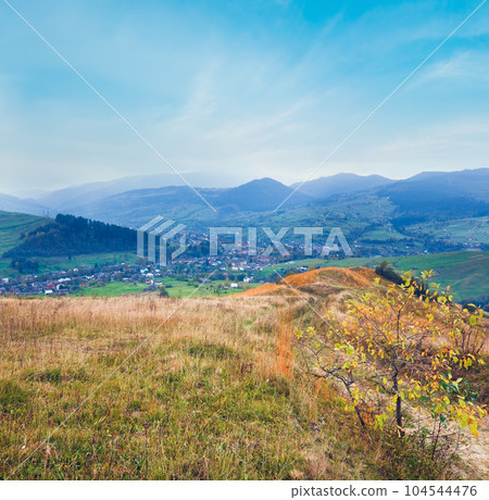 Autumn mountain landscape with village and country road (Trans-Carpathian, Ukraine). 104544476