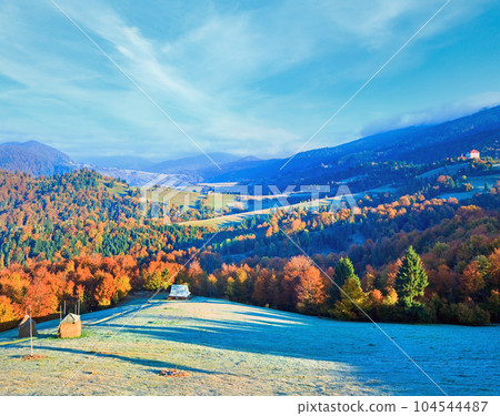 Autumn misty morning mountain valley 104544487