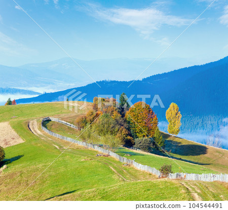 Autumn misty morning mountain hill Autumn misty morning mountain hill 104544491