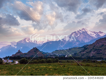 Alps mountain summer morning 104544689