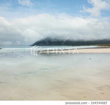 Summer cloudy Ramberg beach, Norway, Lofoten Summer cloudy Ramberg beach, Norway, Lofoten 104544887