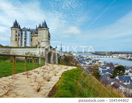 Saumur castle on Loire river (France) spring view. Saumur castle on Loire river (France) spring view. 104544902