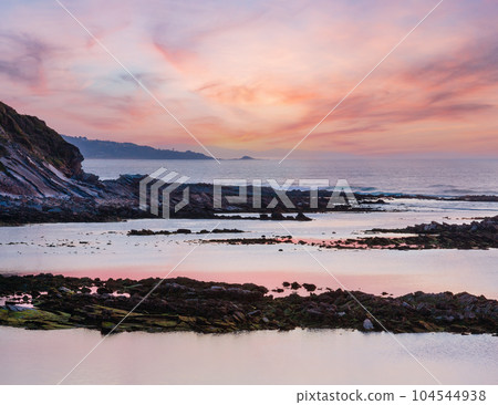Sunset ocean view from beach Sunset ocean view from beach 104544938